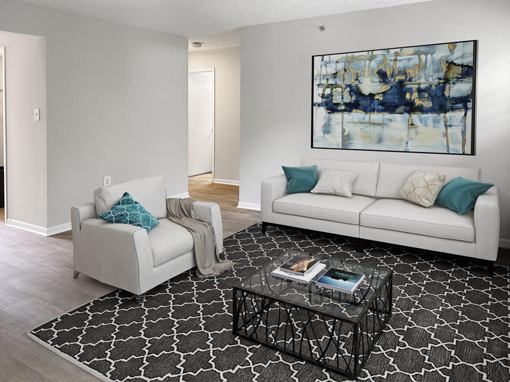 a living room with two couches and a coffee table